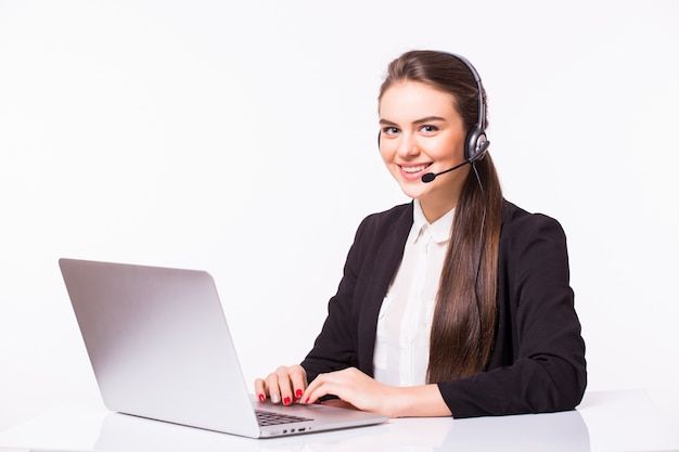 Free Photo Young woman working in office with laptop and headphones on white wall customer service and call center